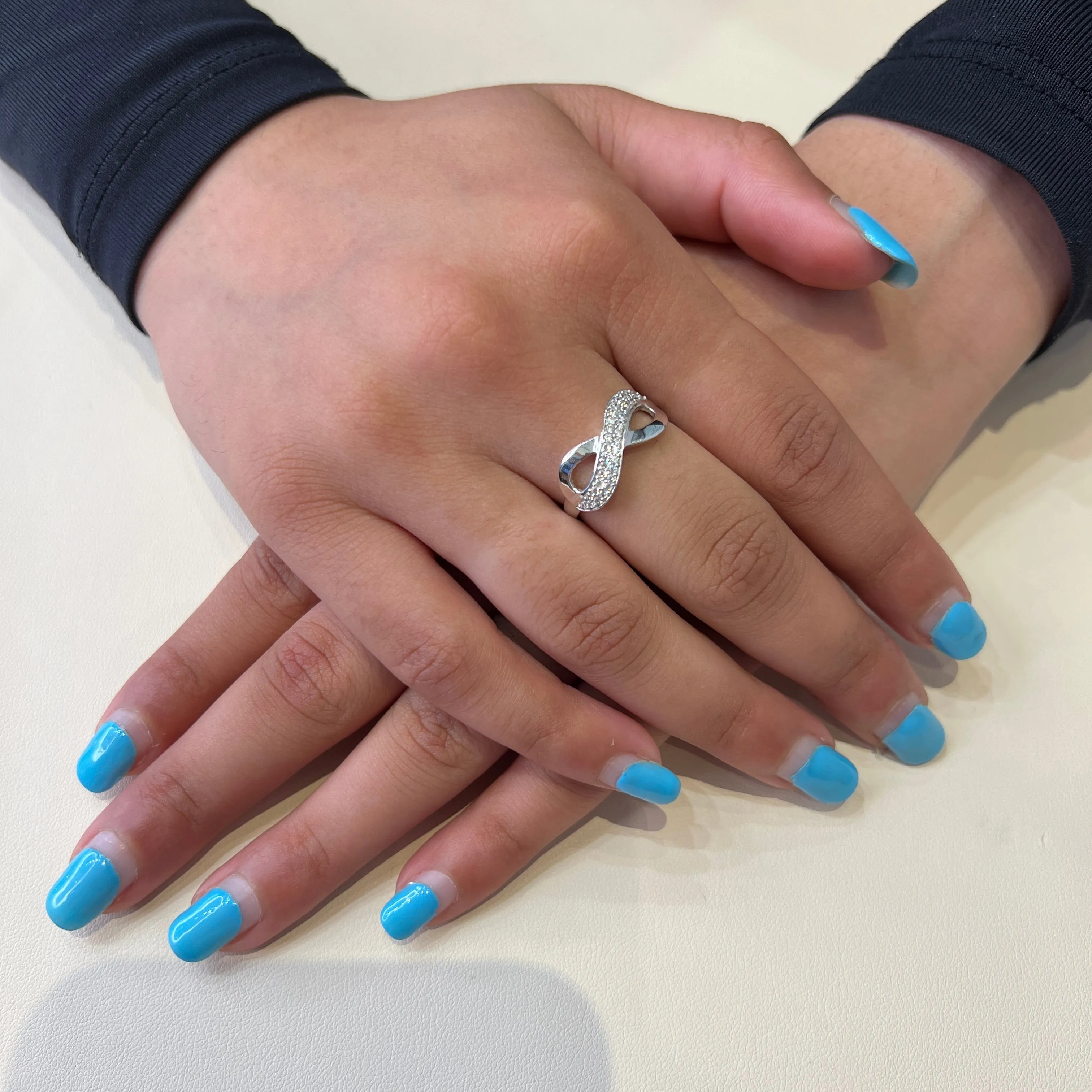 10K White Gold Pavee CZ Infinity Ring