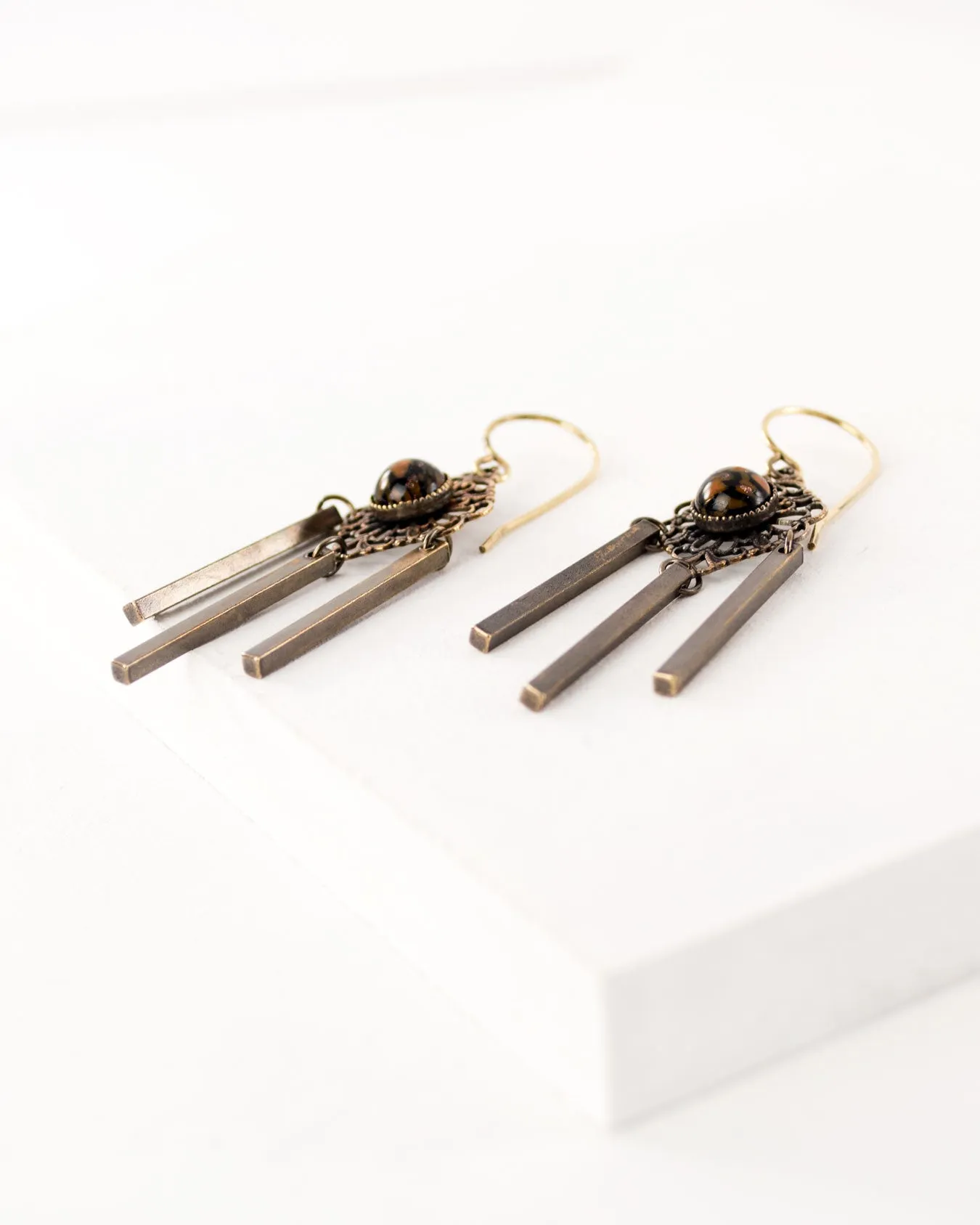 Delicate antique filigree dangles | orange black earrings