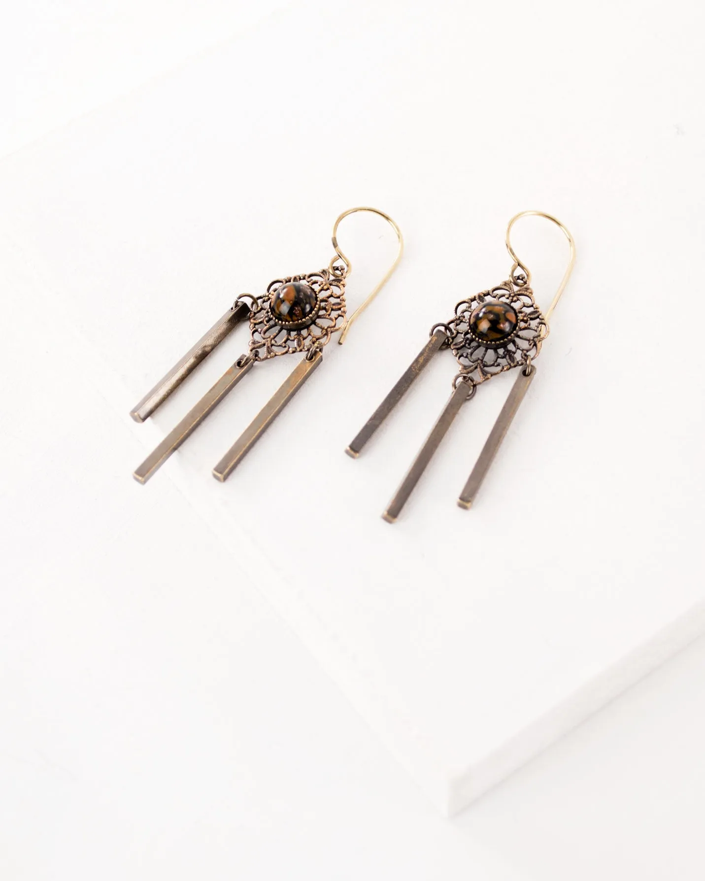 Delicate antique filigree dangles | orange black earrings