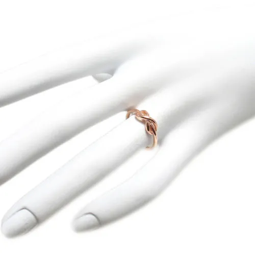 Elegant and Graceful Infinity Knot Ring in Rose Gold Ion Plated Sterling Silver.
