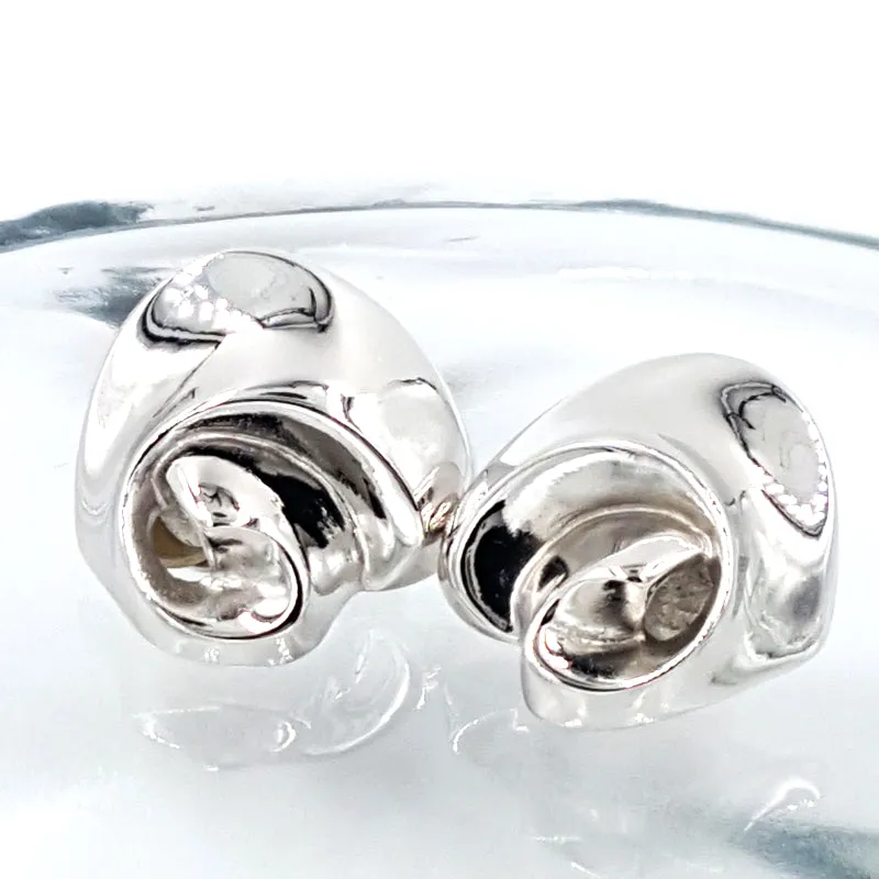 Givenchy Vintage Earrings With Mid Century Modern Style and Abstract Design