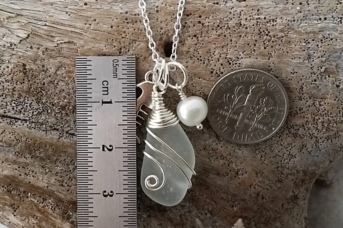 Made in Hawaii, Wire wrapped  Genuine surf tumbled natural sea glass. Fish bone charm, Fresh water pearl, Sea glass jewelry,Beach jewelry.