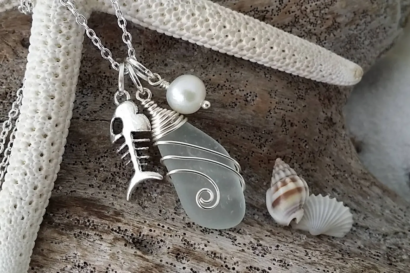 Made in Hawaii, Wire wrapped  Genuine surf tumbled natural sea glass. Fish bone charm, Fresh water pearl, Sea glass jewelry,Beach jewelry.