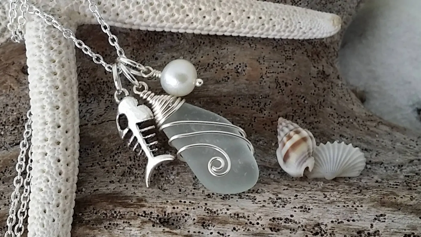 Made in Hawaii, Wire wrapped  Genuine surf tumbled natural sea glass. Fish bone charm, Fresh water pearl, Sea glass jewelry,Beach jewelry.