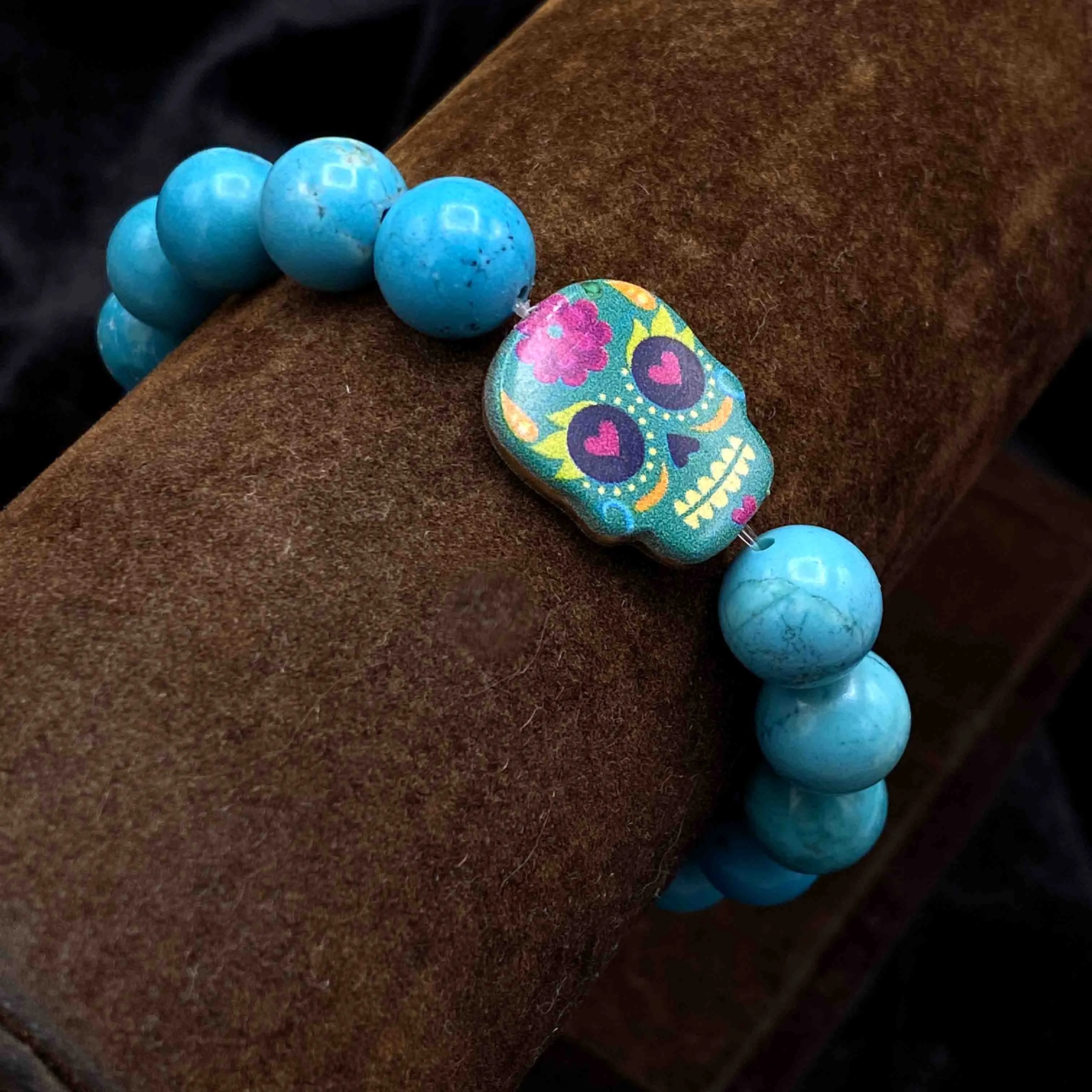 Metal Skull on gemstone beaded bracelet
