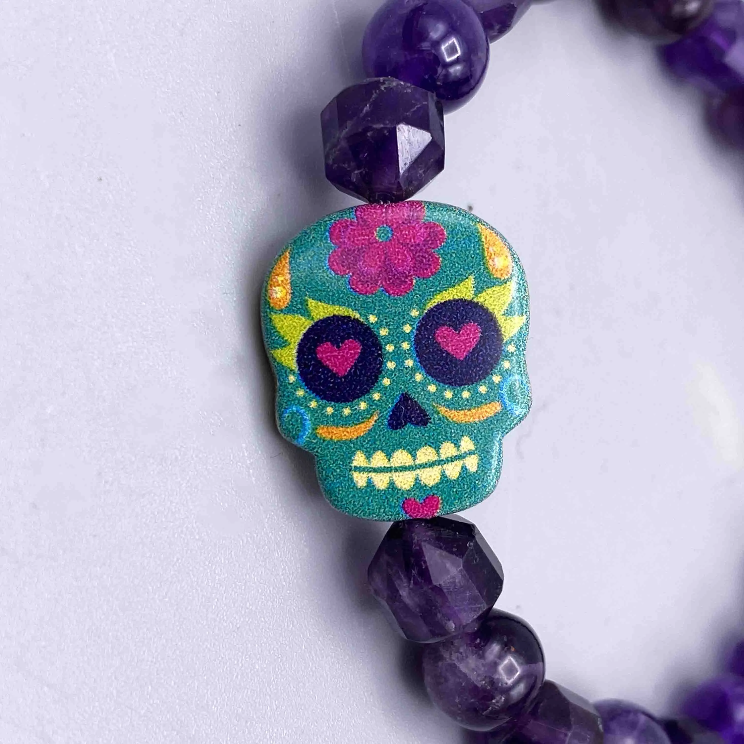 Metal Skull on gemstone beaded bracelet