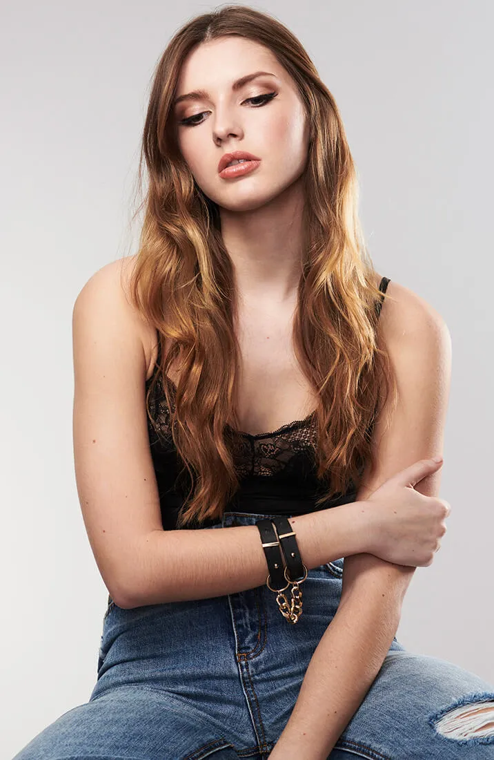 Thin faux leather cuffs with chain