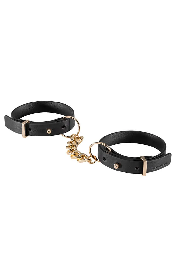 Thin faux leather cuffs with chain