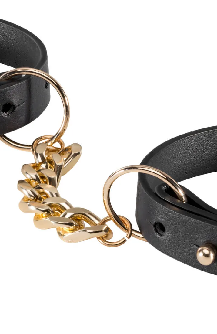 Thin faux leather cuffs with chain